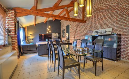 Magnifique rez-de-chaussée type loft avec terrasse et parking Magnifique rez-de-chaussée type loft avec terrasse et parking