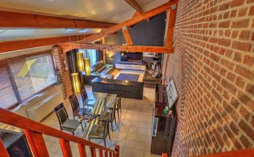 Magnifique rez-de-chaussée type loft avec terrasse et parking Magnifique rez-de-chaussée type loft avec terrasse et parking