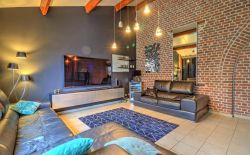 Magnifique rez-de-chaussée type loft avec terrasse et parking Magnifique rez-de-chaussée type loft avec terrasse et parking