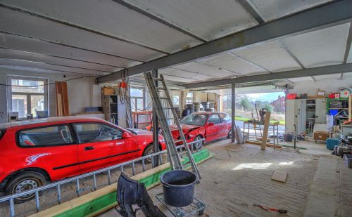 Partie d'un hancien hangar à transformer en habitation