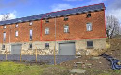 Partie d'un hancien hangar à transformer en habitation