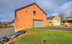 Partie d'un hancien hangar à transformer en habitation