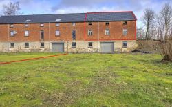Partie d'un hancien hangar à transformer en habitation