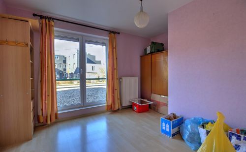 Appartement 2 chambres en bon état situé au rez-de-chaussée