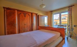 Appartement 2 chambres en bon état situé au rez-de-chaussée