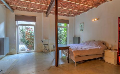 Loft de 100m² avec cour et parking privatif Loft de 100m² avec cour et parking privatif