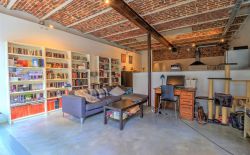 Loft de 100m² avec cour et parking privatif Loft de 100m² avec cour et parking privatif