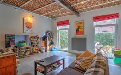 Loft de 100m² avec cour et parking privatif Loft de 100m² avec cour et parking privatif