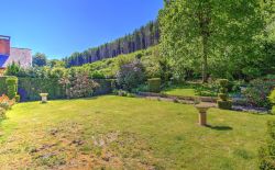 Villa 4 chambres à rénover avec jardin arboré et garage