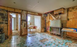 Maison 3 chambres à rénover avec jardin et garage