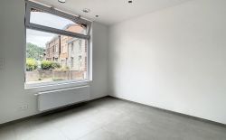 Maison de commerce ou pour profession libérale au centre de Vaux-sous-Chèvremont