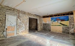 Rez-de-chaussée commercial au centre de Vaux s/Chèvremont