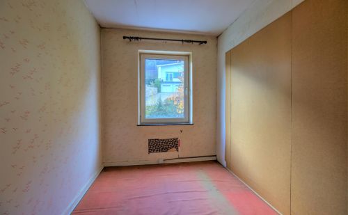 Maison 4 chambres à rénover avec jardin et garage