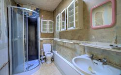 Maison 4 chambres à rénover avec jardin et garage