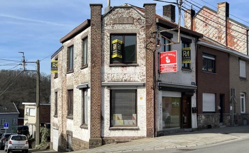 Parts de société à racheter avec immeuble de coin à GH.