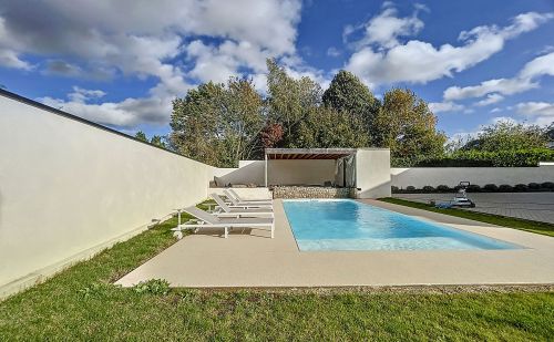 Grand appartement avec jardin commun et piscine à Vottem