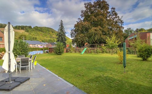 Belle maison 4 chambres avec garage, carport et jardin
